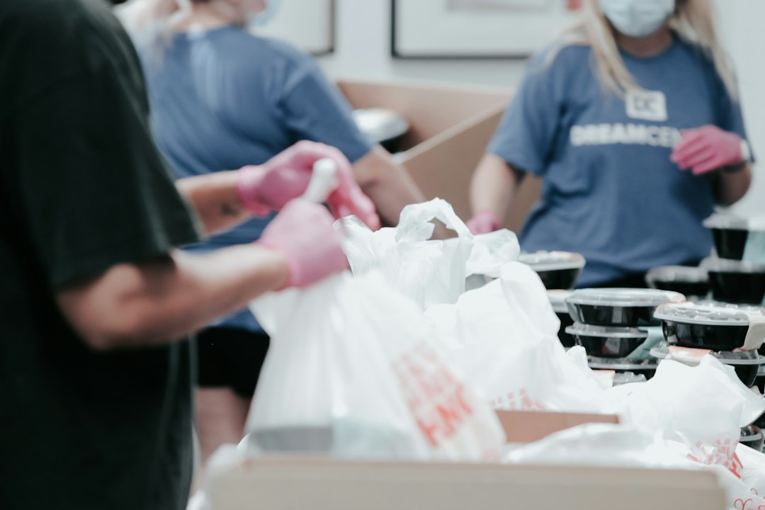 Community volunteers preparing support supplies for World Homeless Day 2026