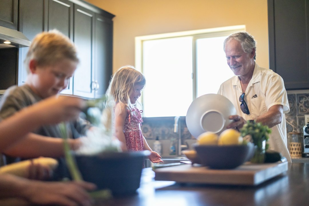 Family cooking healthy food together for International Chefs Day 2026 Food Explorers