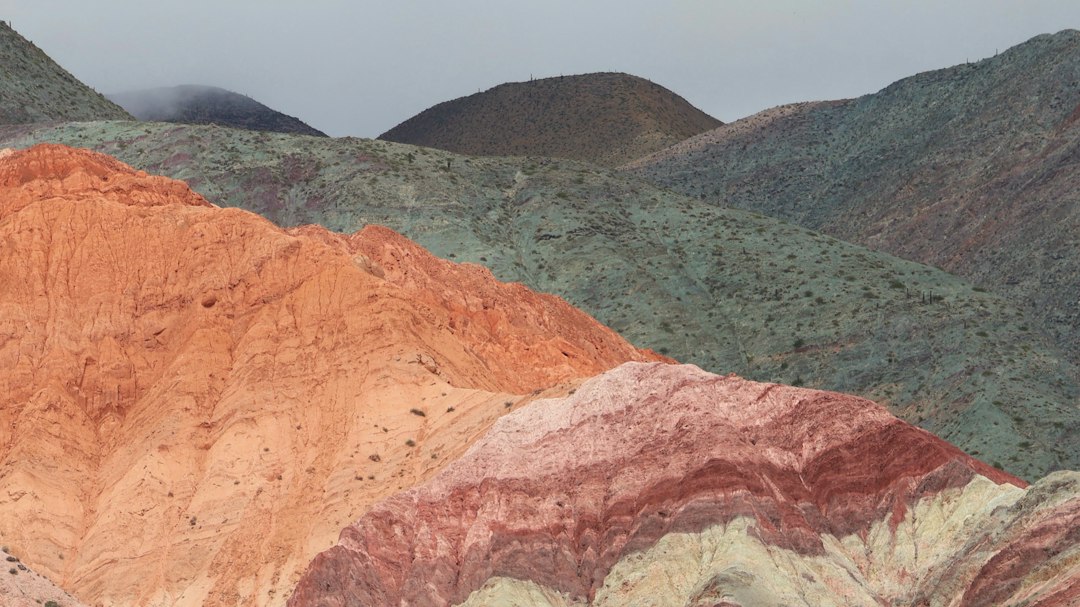 Colorful geological mountain layers for International Geodiversity Day 2026