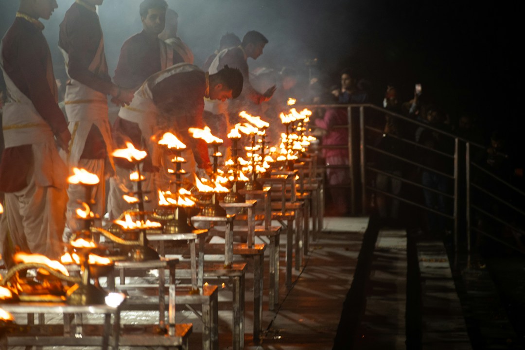 Prayagraj Sangam devotional lamps representing Dev Deepawali 2026