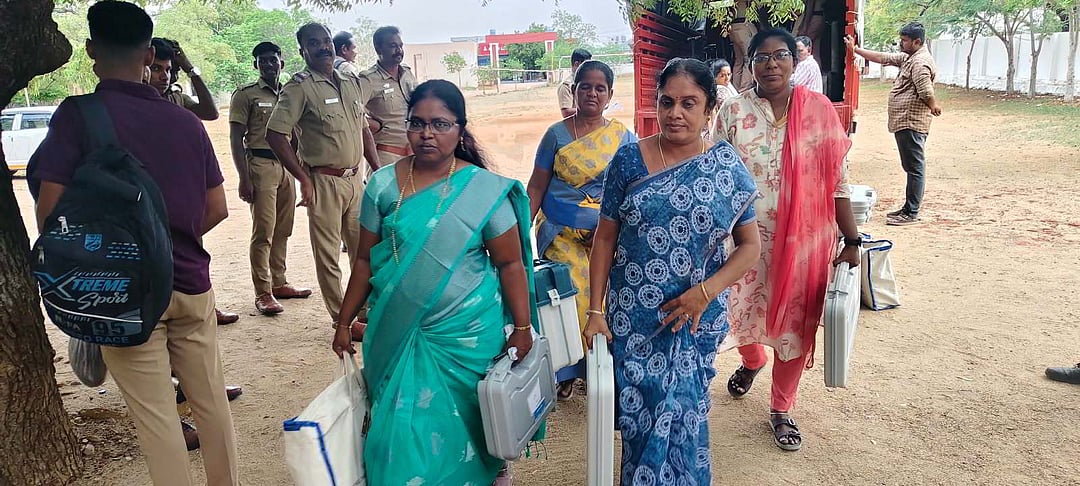 Electoral officers making arrangements at polling booths in Dharapuram for the 2026 by-election