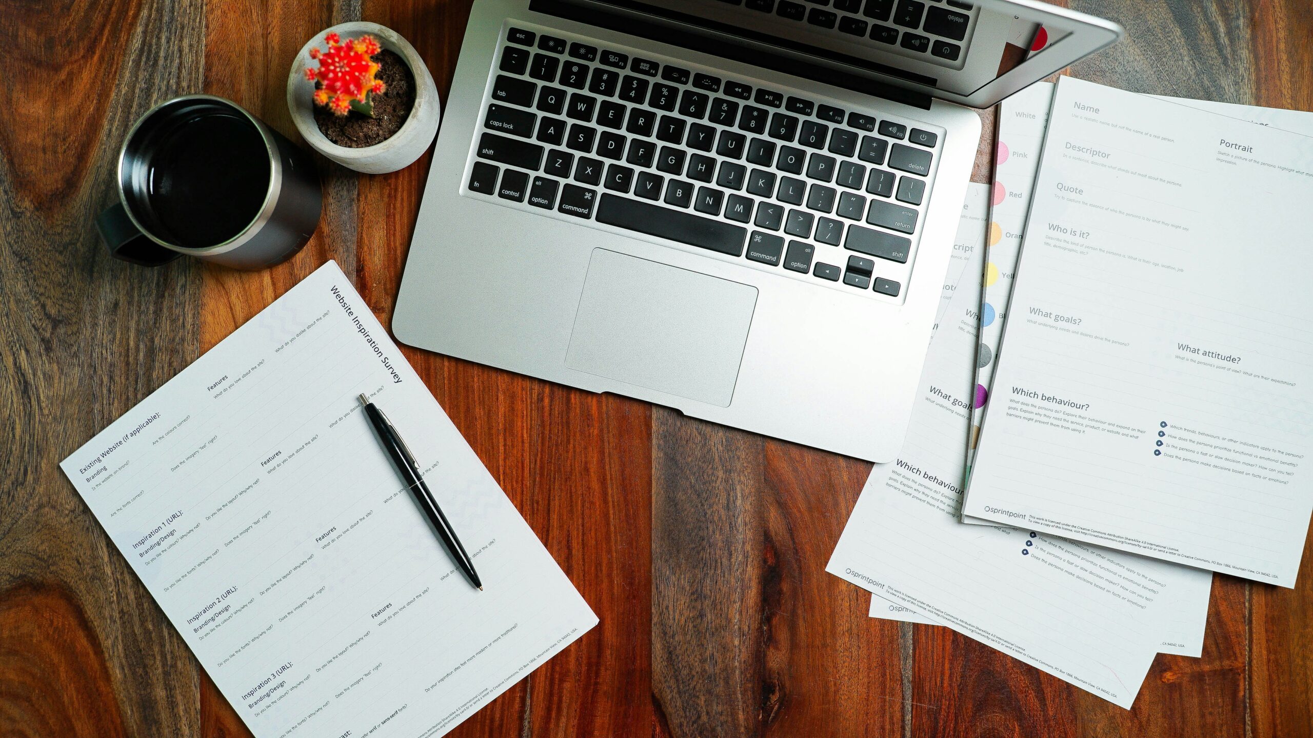 Documents and laptop prepared for a government job application in India