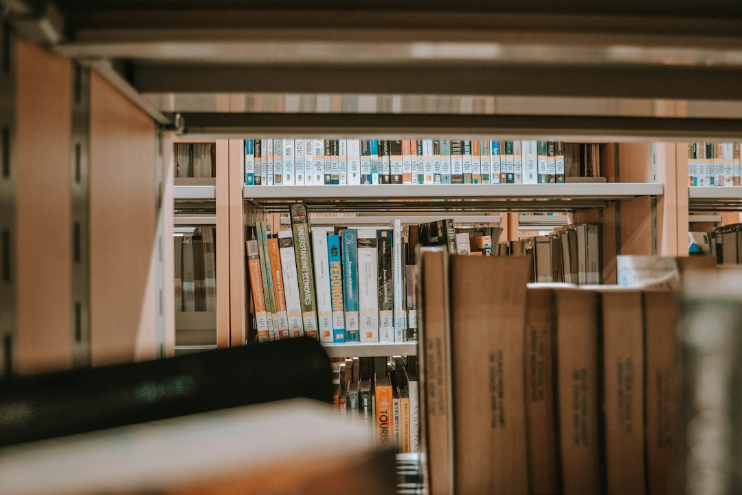 University library bookshelves illustrating Gujarat National Law University library recruitment