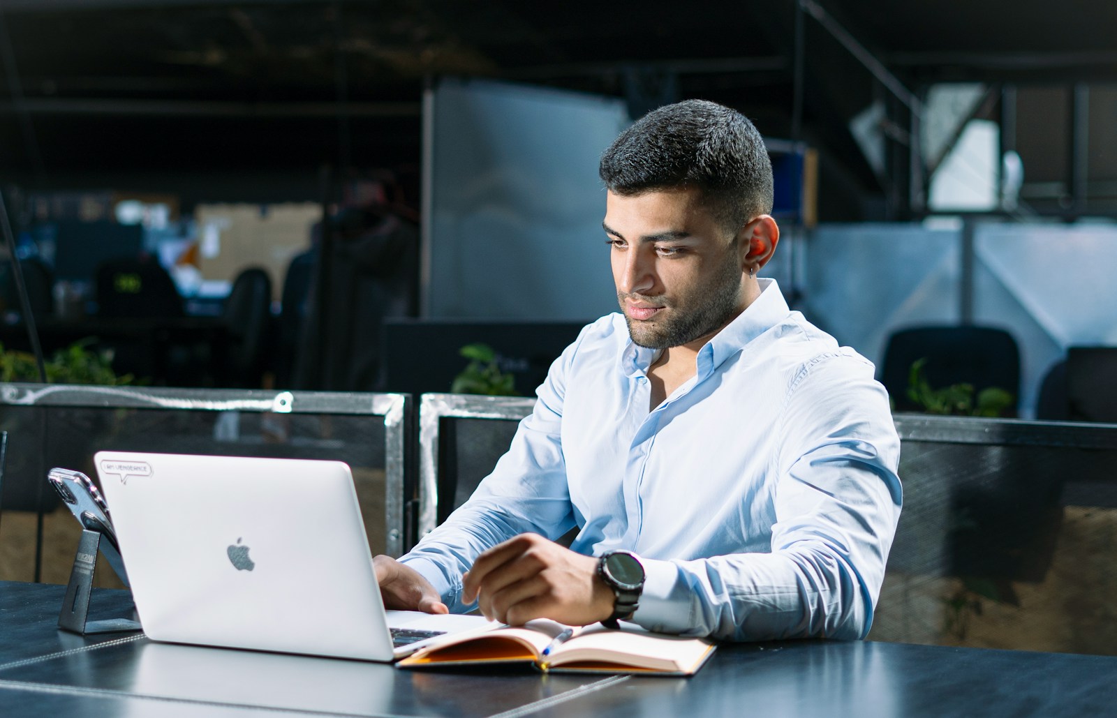 Candidate reading a government job recruitment notification on a laptop