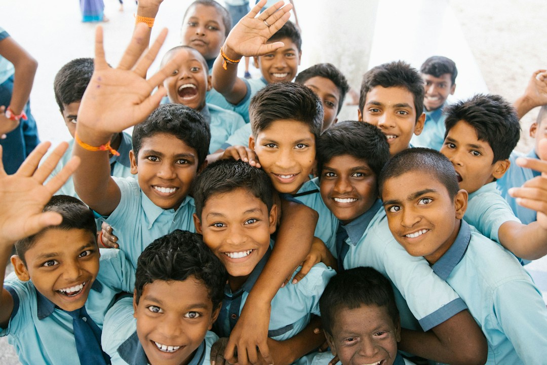 Volunteers helping children for International Volunteer Day 2026