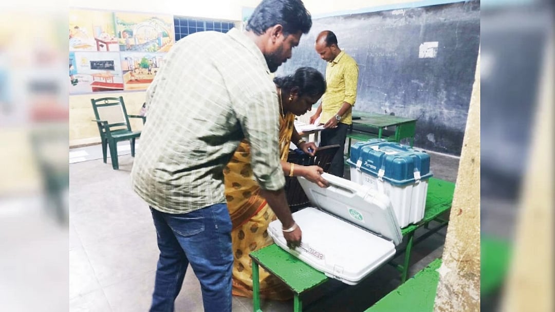 Election officials setting up a polling booth in Madurantakam for the 2026 by-election