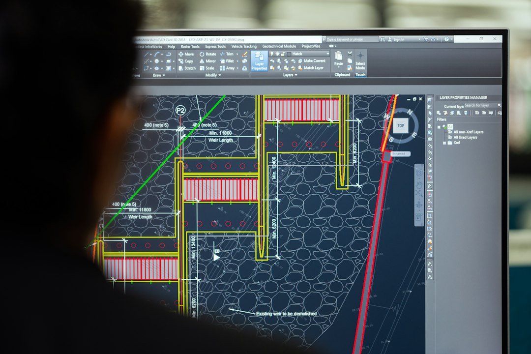 Engineering professional reviewing technical plans for the OPSC Assistant Executive Engineer recruitment