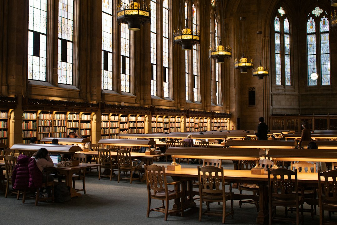 University library bookshelves representing library and store recruitment
