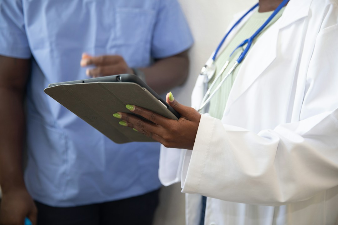 Doctor discussing healthcare with a patient for Universal Health Coverage Day 2026
